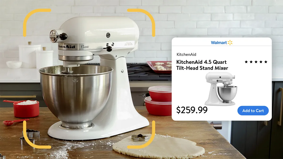 A white KitchenAid stand mixer is on a table. A box with Walmart information is on the right with the price of $259.99.