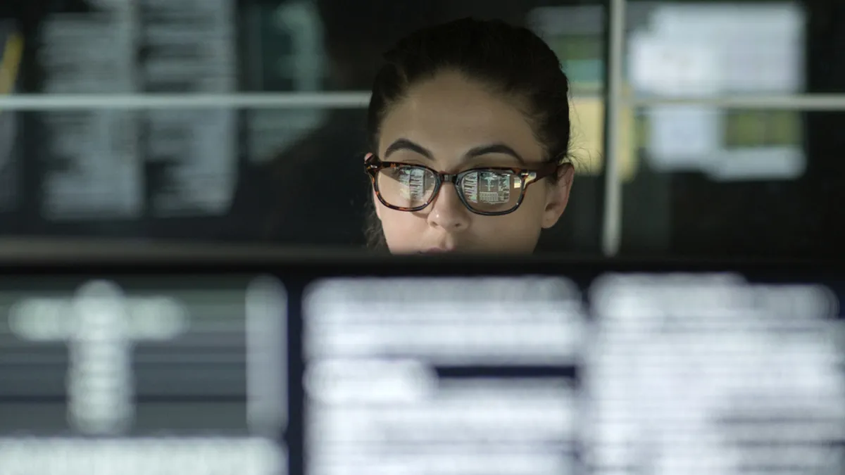 Woman looking at computer screen