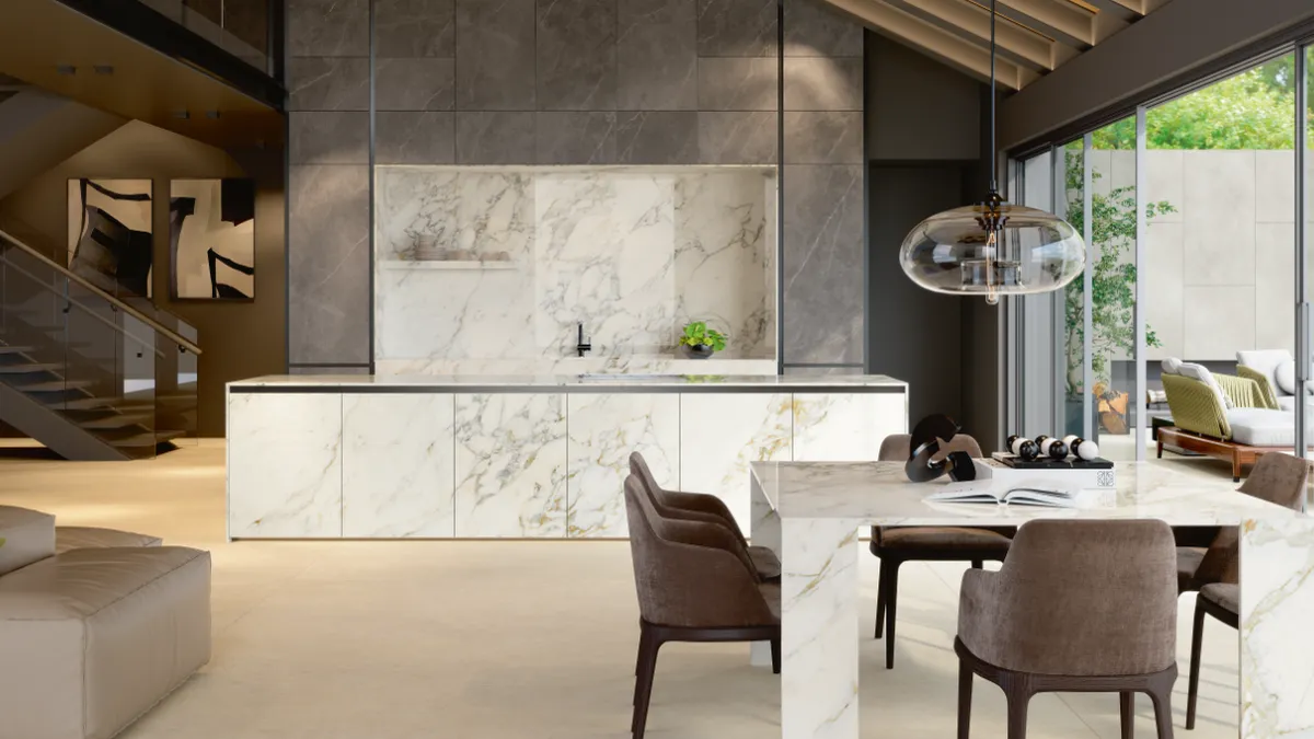 A kitchen with marble surfaces.