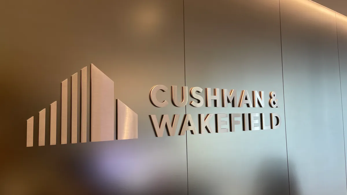 Sign spelling Cushman & Wakefield