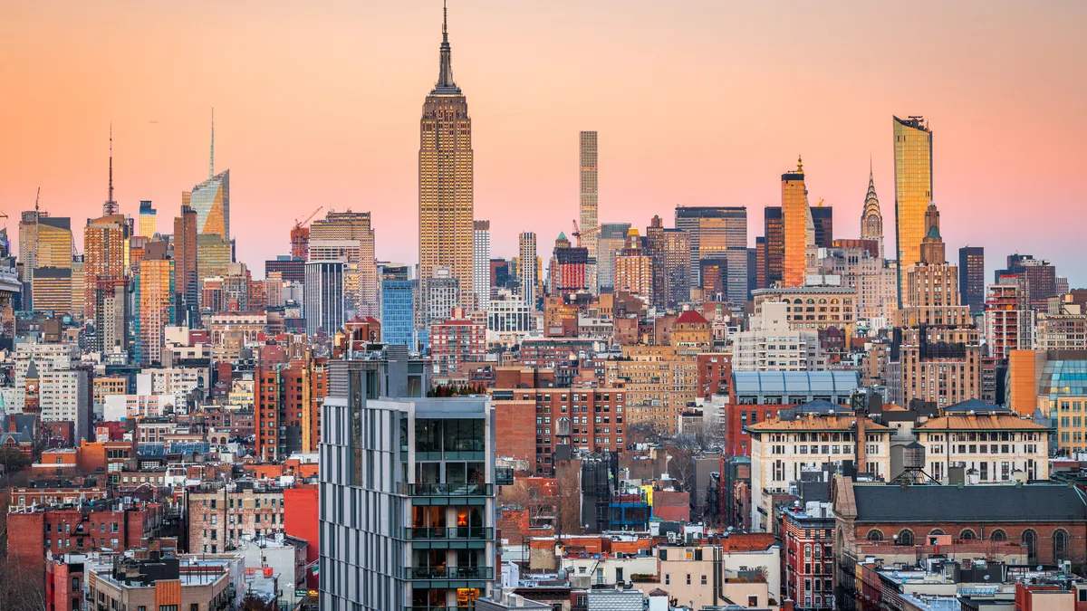 New York City, USA midtown Manhattan skyline at dusk.