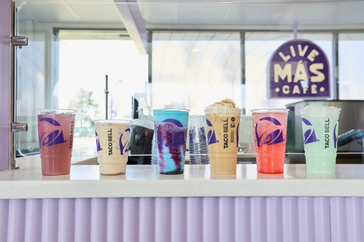 An image of several specialty drinks from Taco Bell's Live Mas Cafe lined up on a white counter top.