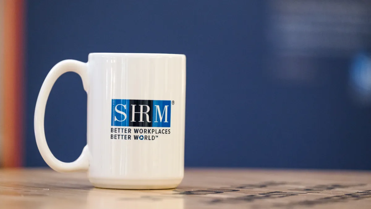 A SHRM mug.