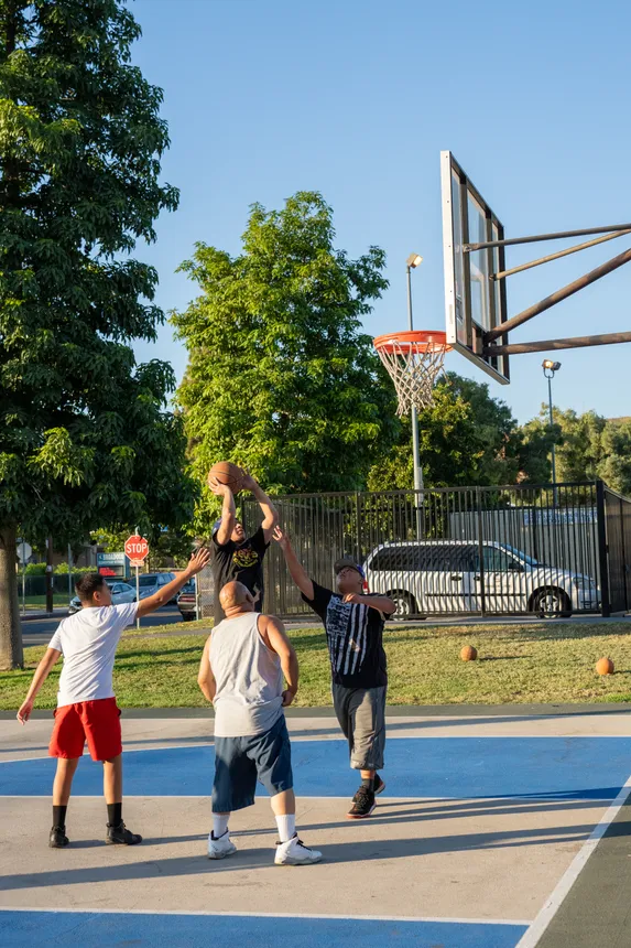 People play basketball