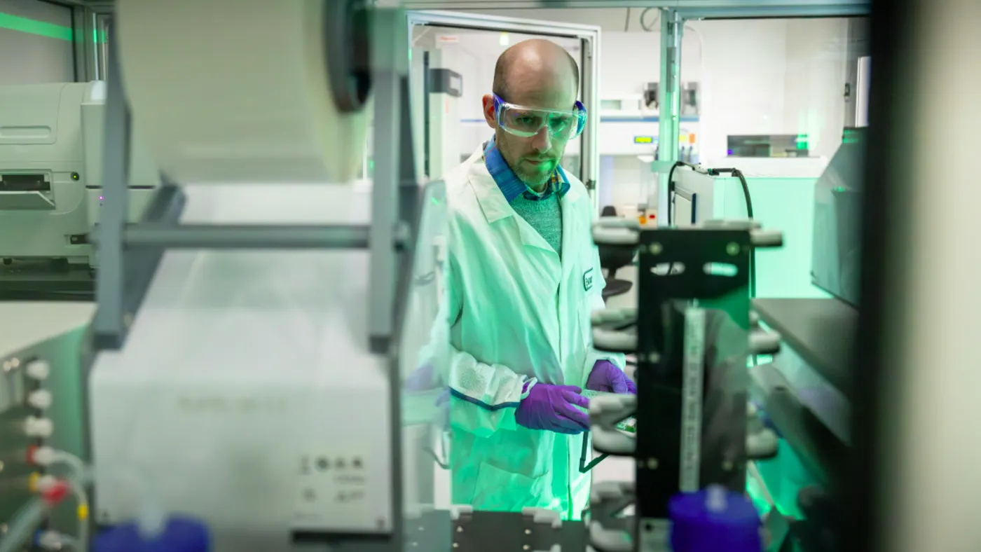 A Bristol Myers Squibb employee works in one of the company's labs.