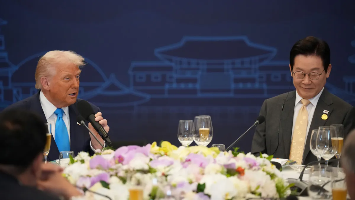 U.S. President Donald Trump speaks at a dinner next to South Korea President Lee Jae Myung on Oct. 29, 2025, in Gyeongju, South Korea.