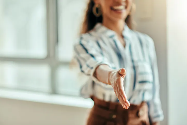 woman offering handshake