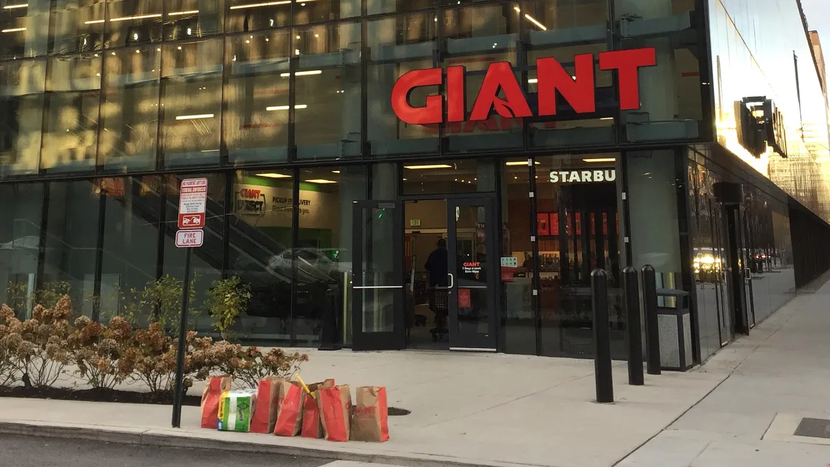 Exterior of grocery story with sign