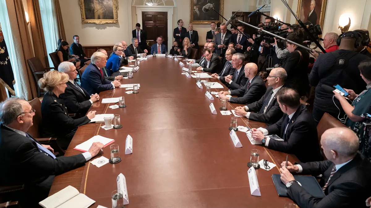 President Donald Trump and Vice President Mike Pence meet with representatives from pharmaceutical companies on March 2, 2020