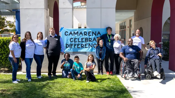 Students and staff stand outside Chula Vista Elementary School District's Camarena Elementary School.