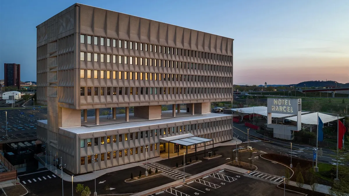 The Brutalist concrete exterior of Hotel Marcel.