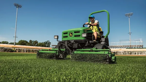 John Deere equipment on a field