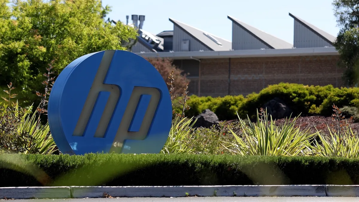 A sign is posted in front of a Hewlett-Packard (HP) office on May 29, 2024 in Palo Alto, California.