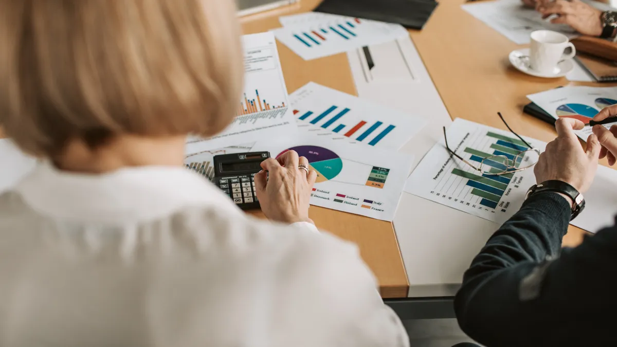 Woman doing paperwork in corporate office