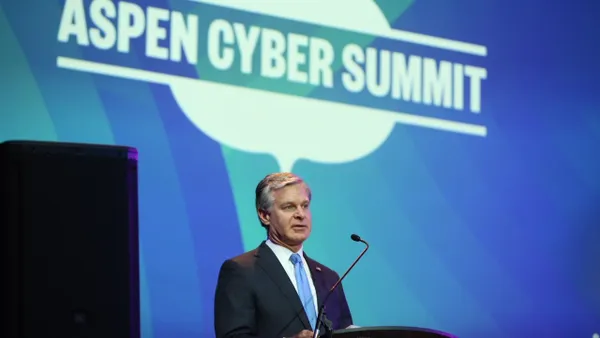 FBI Director Chris Wray announces a major operation to disrupt a state-linked botnet, during a speech the Aspen Cyber Summit, Sept. 18, 2024.