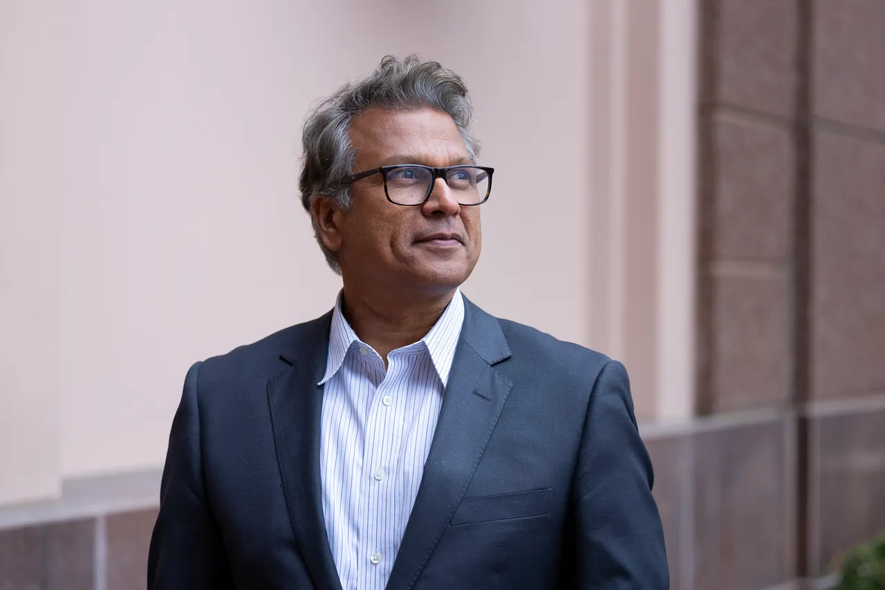 Dru Rai wearing business attire