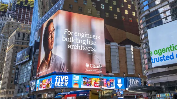 Giant illuminated billboard for the company Anthropic in Times Square in New York City