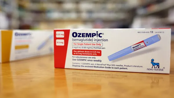 Boxes of the diabetes drug Ozempic rest on a pharmacy counter