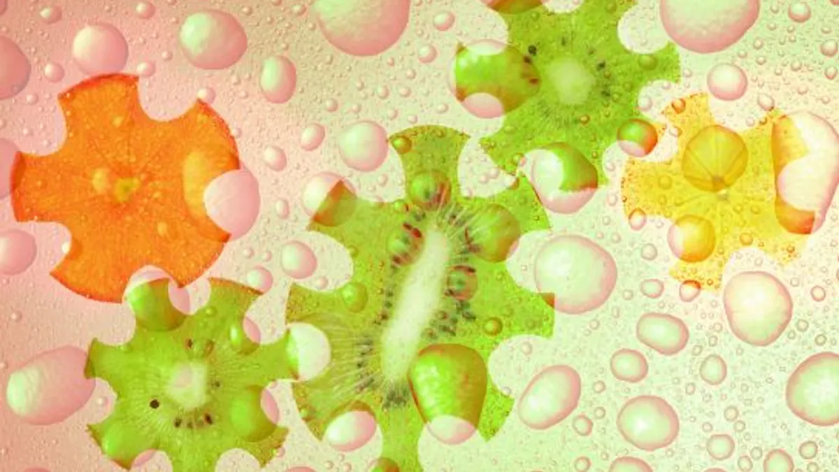 Gear drive made of kiwi slices on abstract background, double exposure