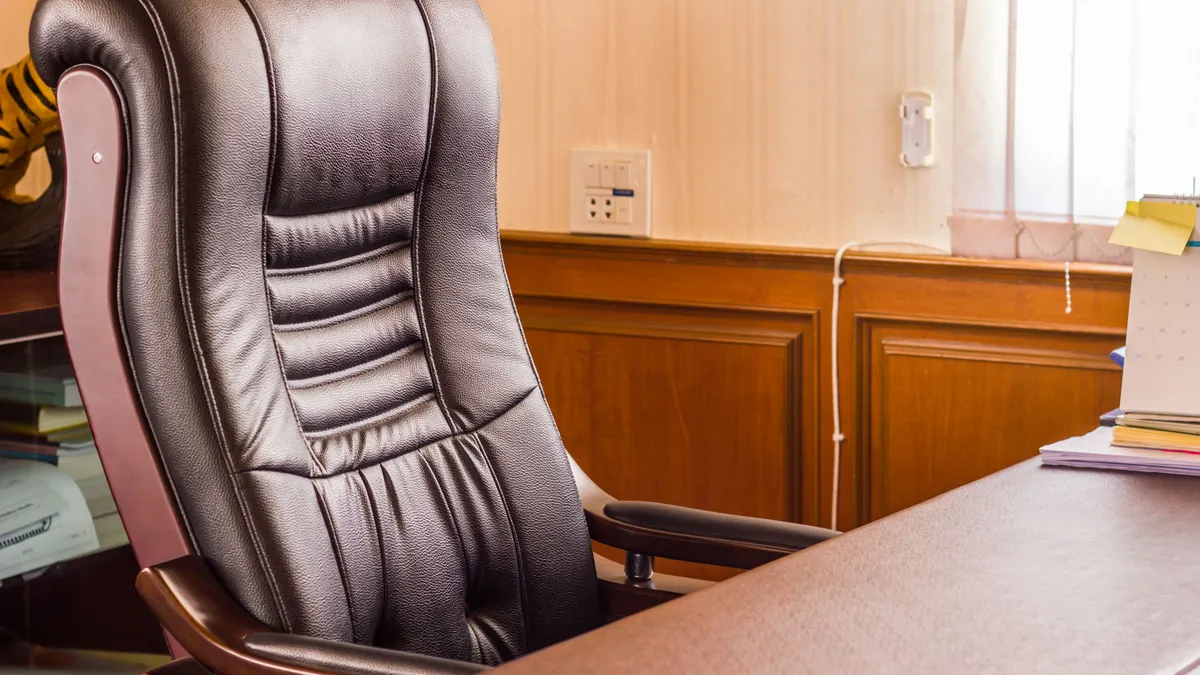 Empty chair in office