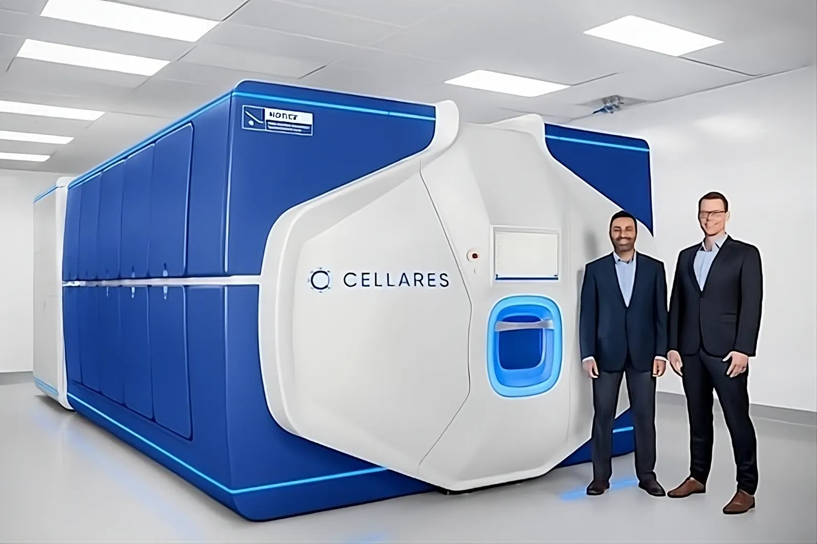 Two people in business suits stand next to a closed manufacturing pod emblazoned with the word Cellares.