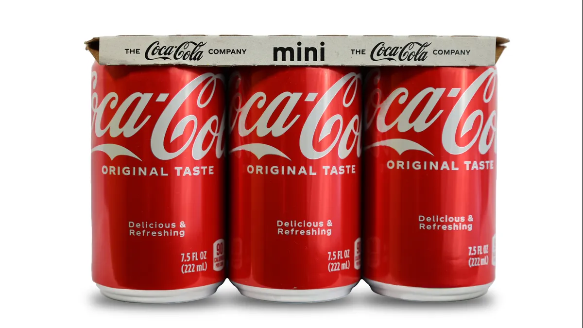 6-pack of mini Coca-Cola cans held by Graphic Packaging fiber-based packaging