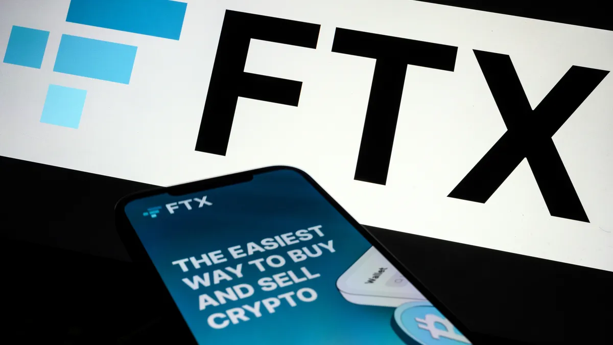 FTX signage is shown with a phone in the foreground