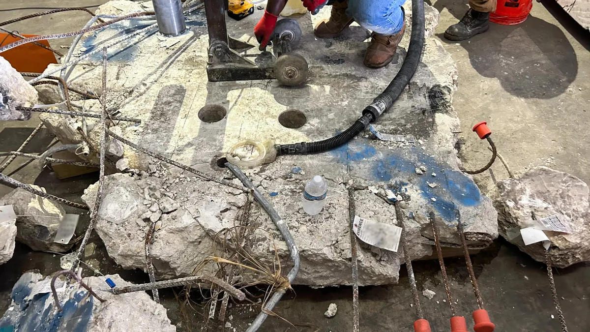 A chunk of concrete being tested in a lab