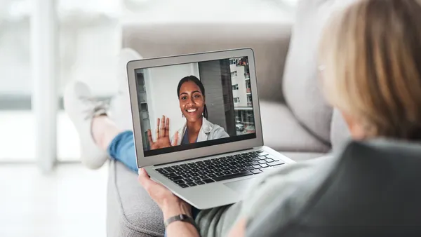 Senior woman using laptop