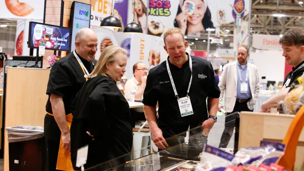people volunteering in a food warehouse