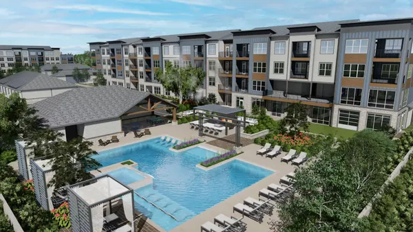An apartment building and pool deck.