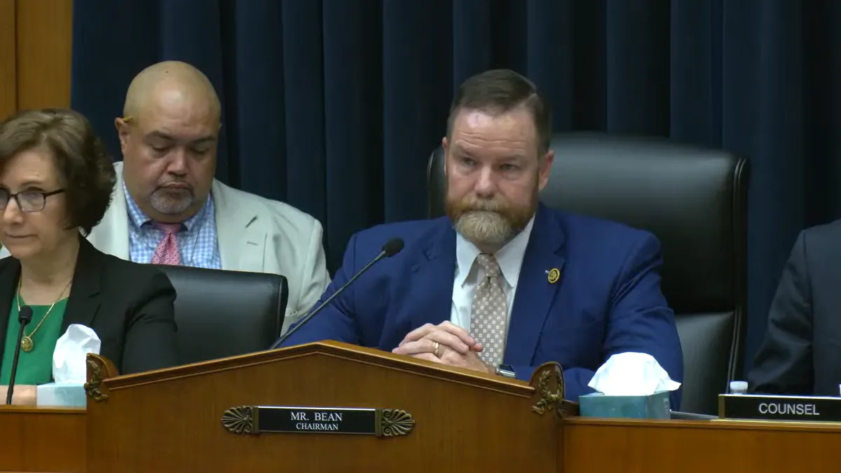 Rep. Aaron Bean listens during a House subcommittee hearing