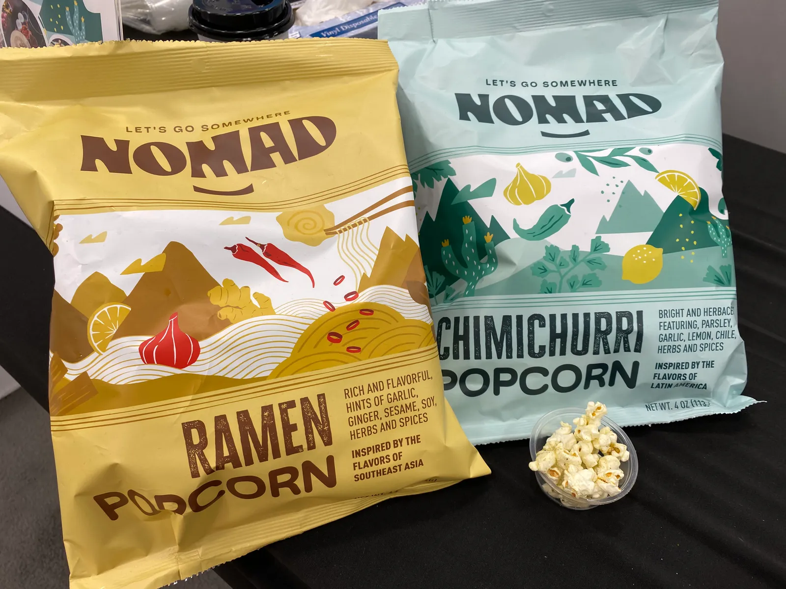 Packages of Nomad Snacks&#x27; popcorn at the Sweets &amp; Snacks Expo in Indianapolis in 2024.