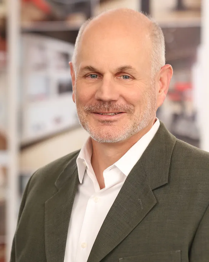 A professional headshot of Timothy Haley.