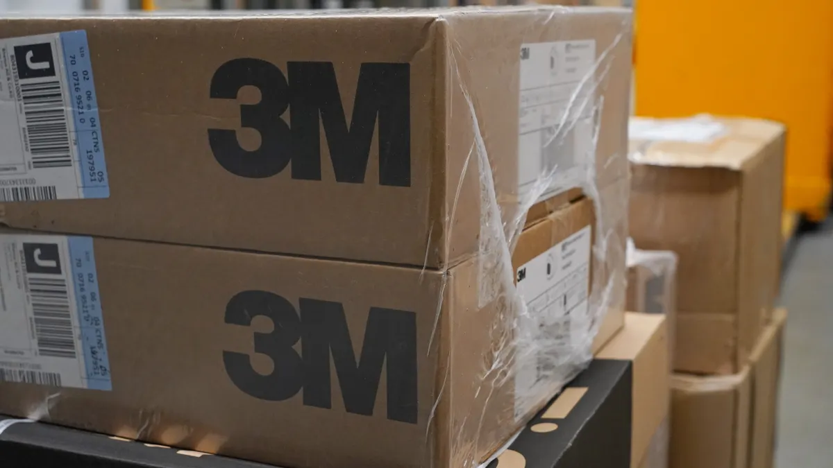 Boxes containing 3M gas, vapor and particulate filters stand ready for shipment at the Rhenus logistics center during the coronavirus crisis on April 16, 2020