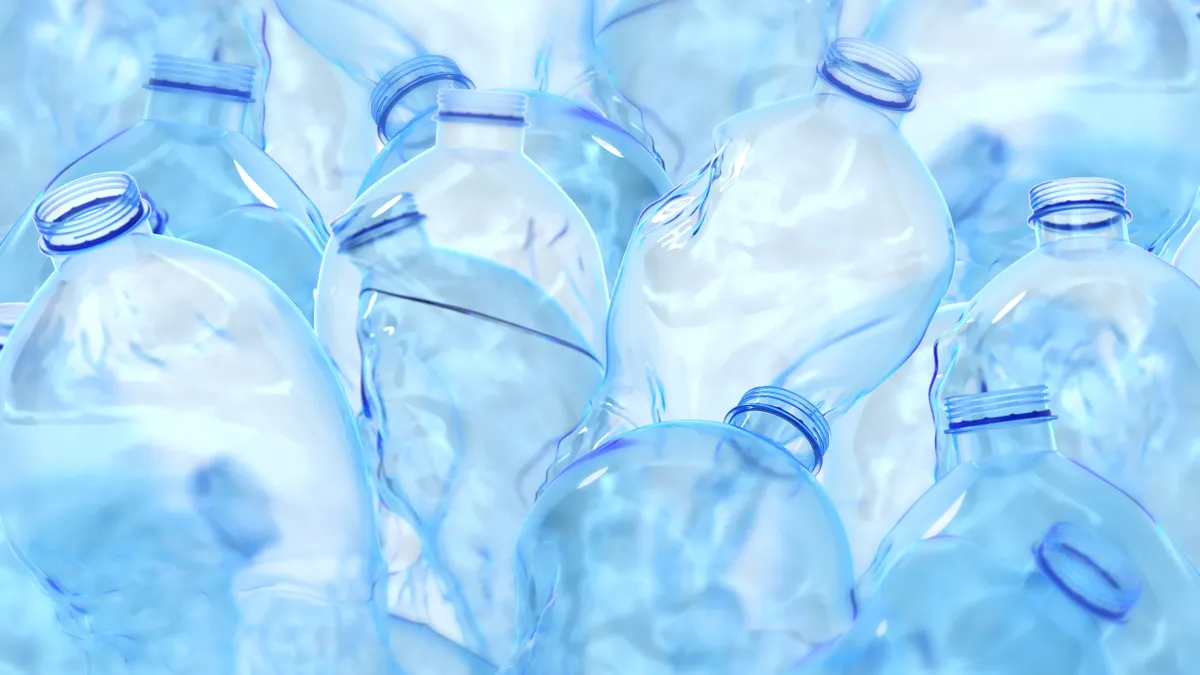 Close up view of blue plastic beverage bottles.