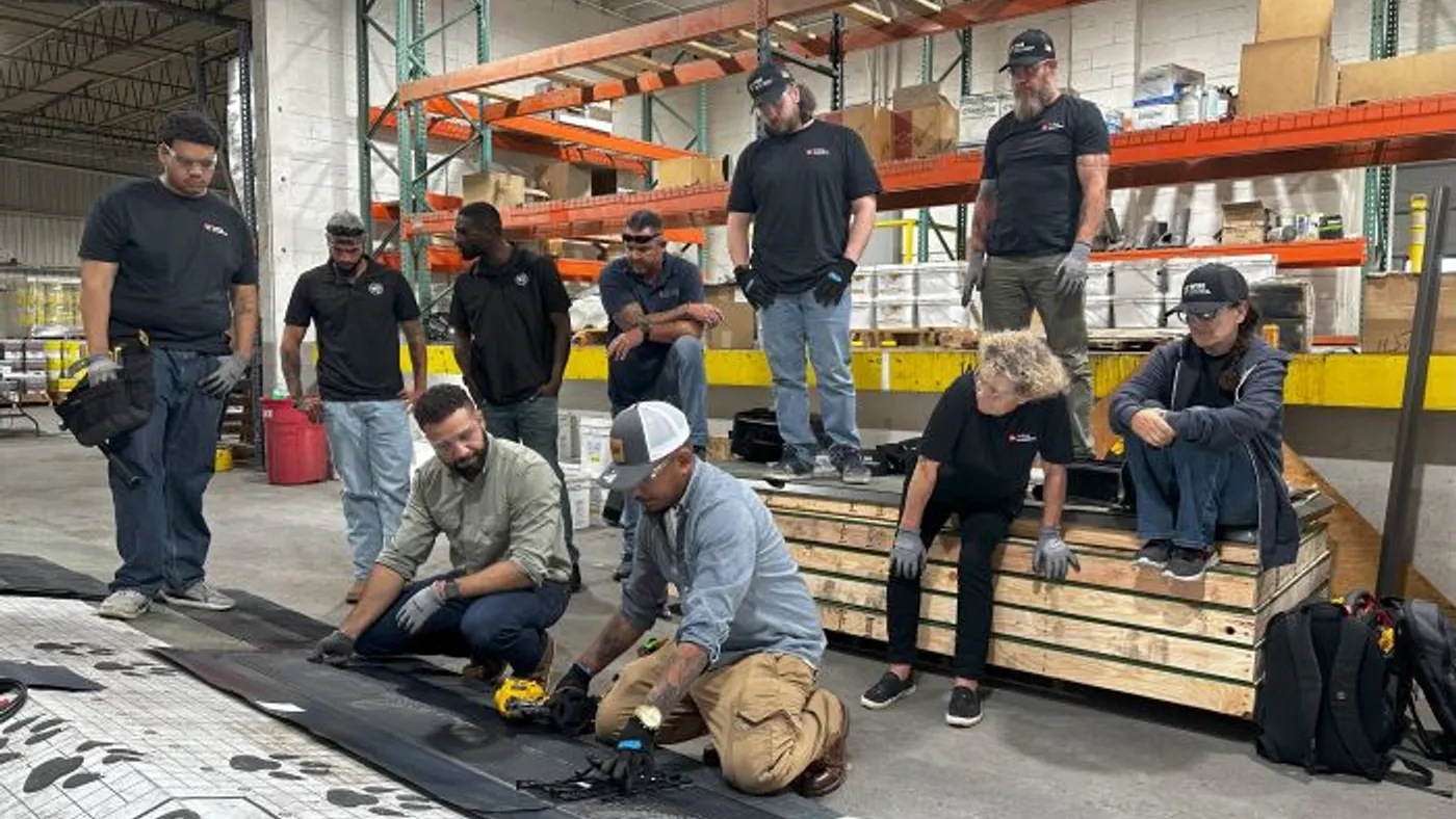 participants learn about roofing and the skilled trades