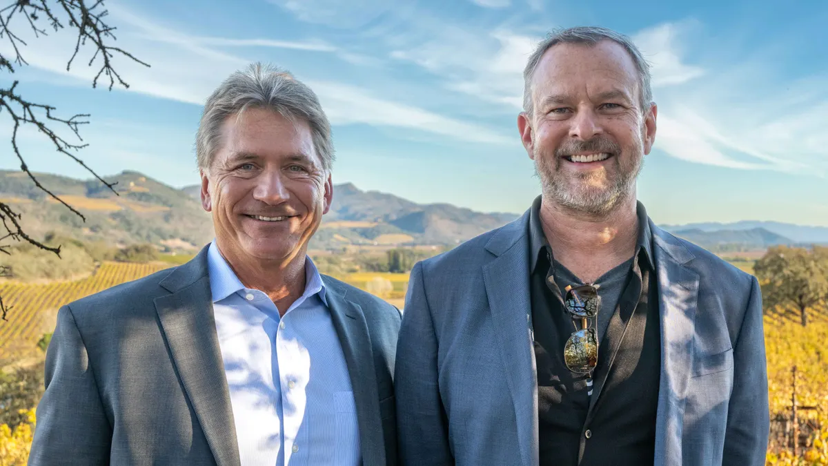 A photo of Ionis CEO Brett Monia and Metagenomi CEO Brian Thomas.