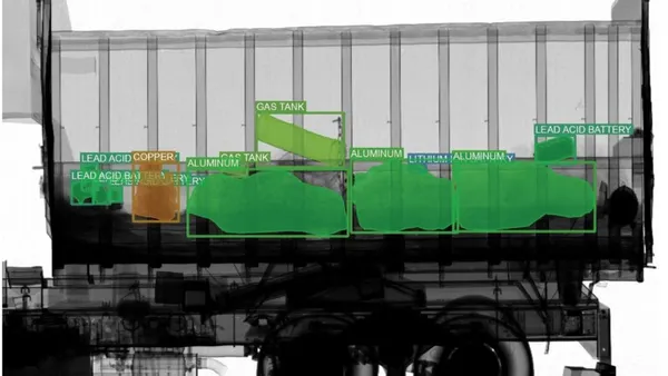 An x-ray image of a truck bed filled with materials. A screen indicates what each of the materials is made of.
