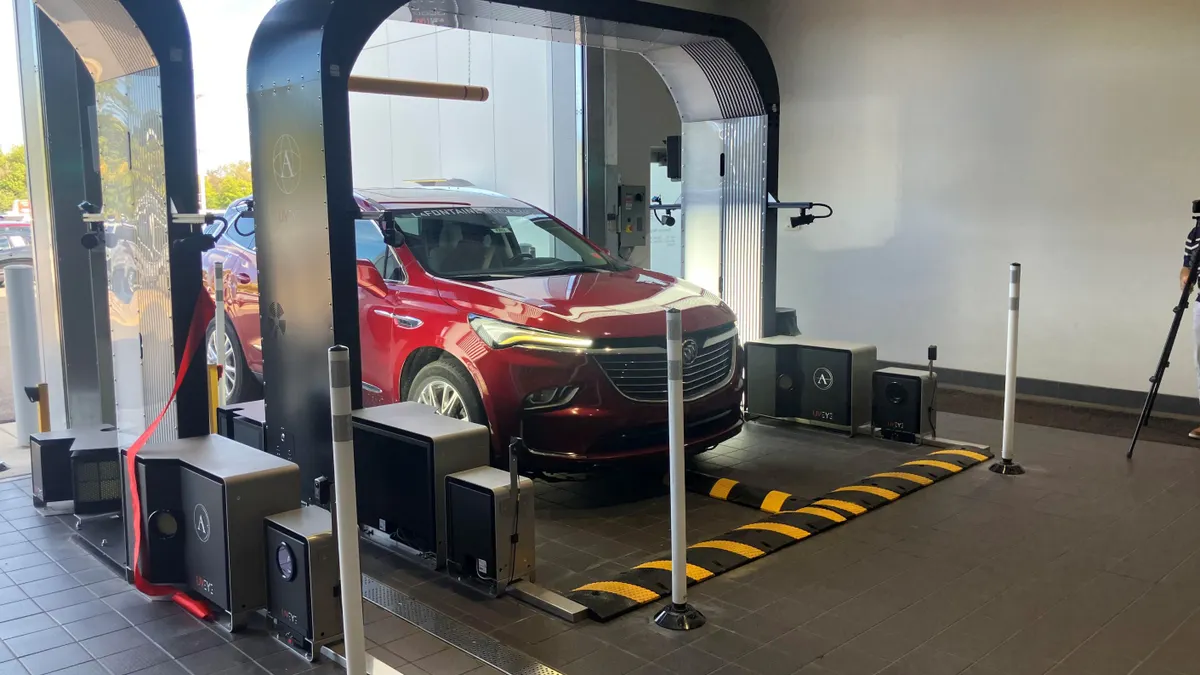 A vehicle under UVeye scanning system