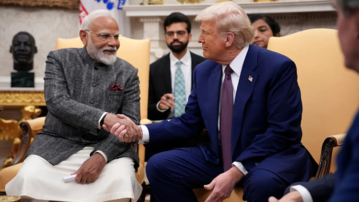 U.S. President Donald Trump shaking hands with India Prime Minister Narendra Modi