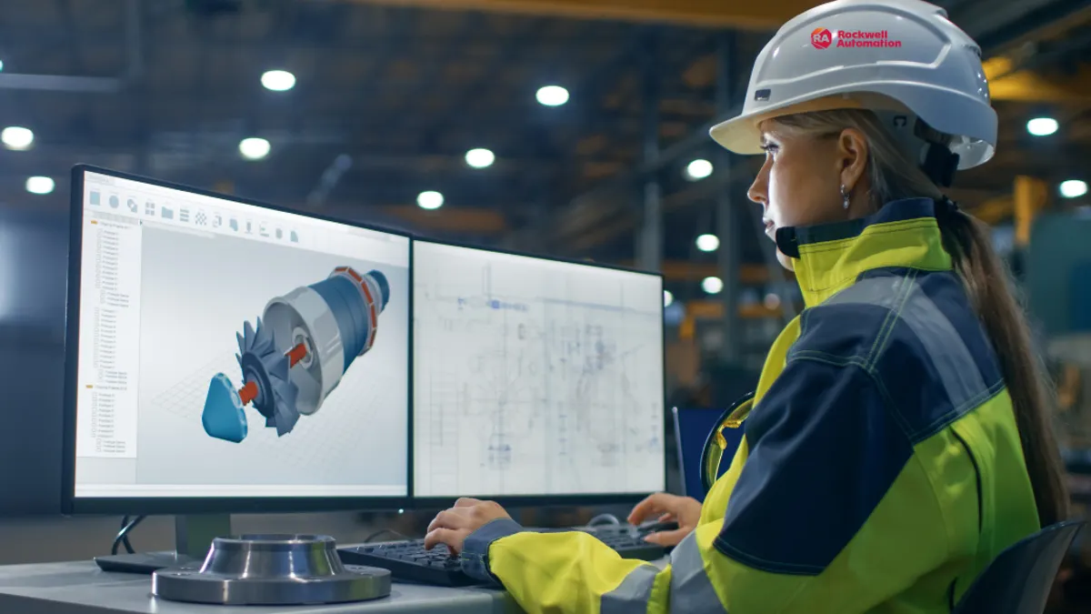 ndustry Factory Female Industrial Engineer Works on the Personal Computer on the Turbine/ Engine Project in 3D Using CAD Program.