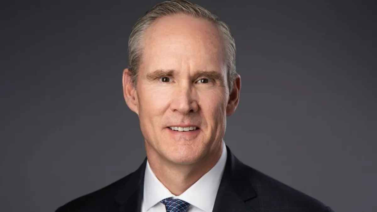 A headshot of new Olympus CEO Bob White.