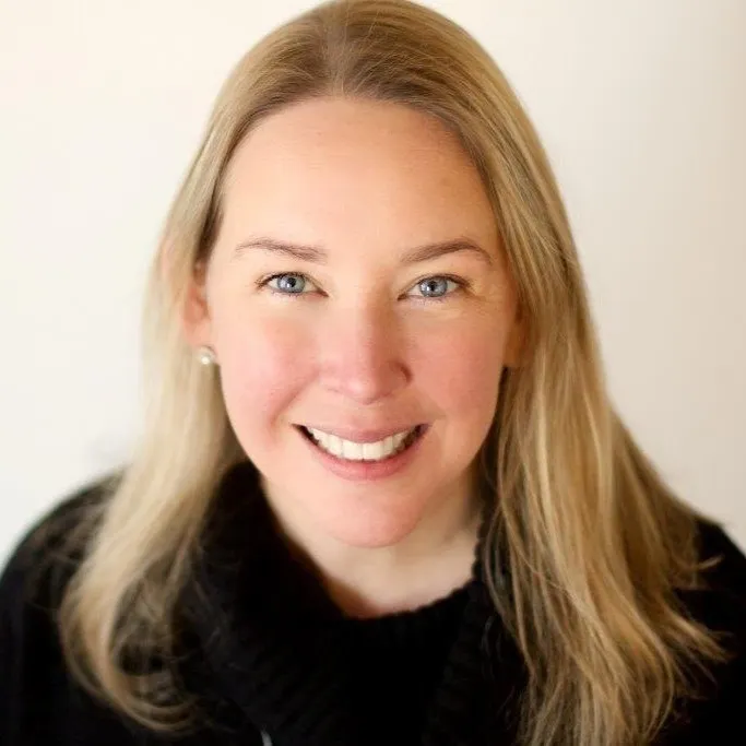 A headshot of executive Ann Caruso.