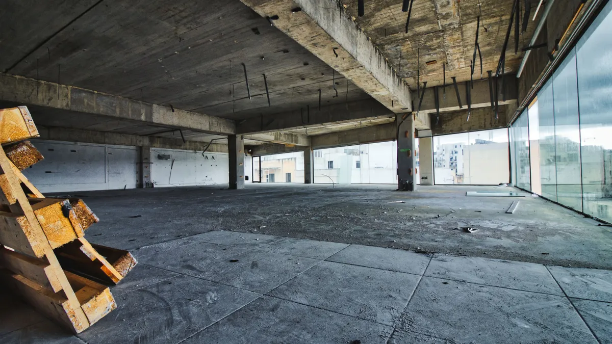 An empty floor on a building under construction.