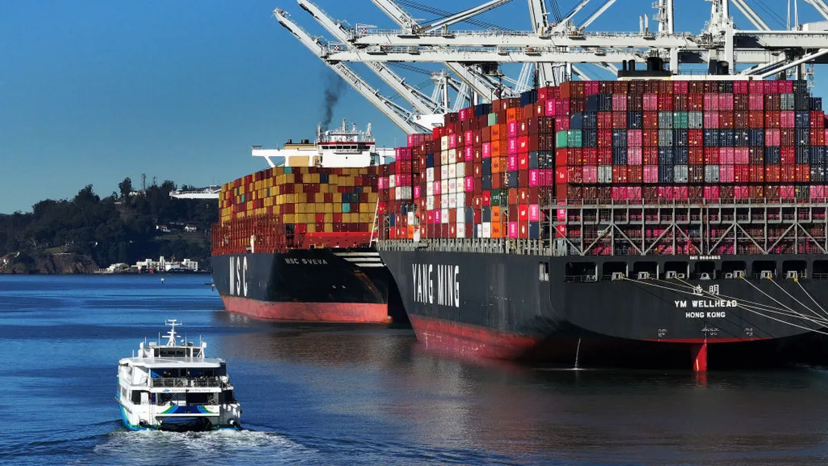 In an aerial view, container ships sit docked at the Port of Oakland on December 09, 2024 in Oakland, California.