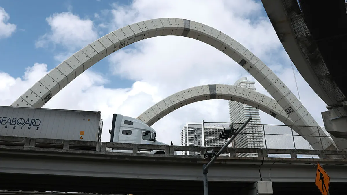 Truck over bridge Miami Florida