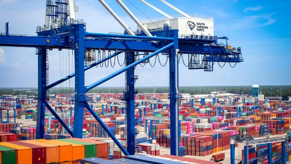 Several colorful containers stacked at a terminal located in South Carolina.