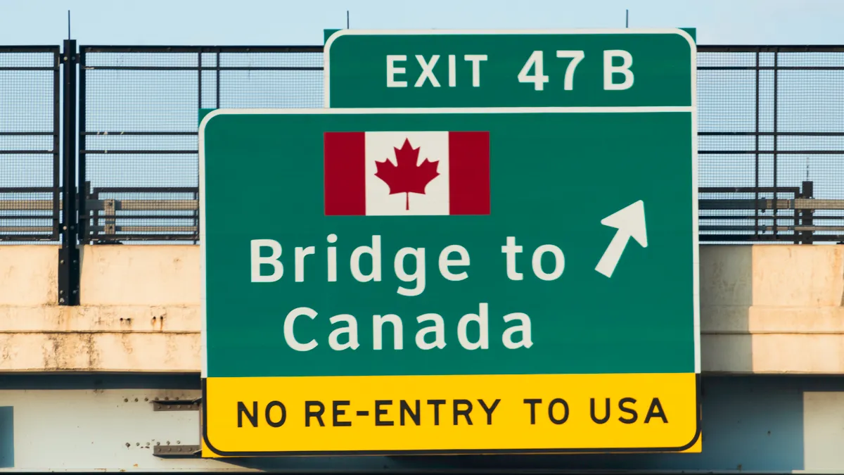 Canada border crossing highway sign