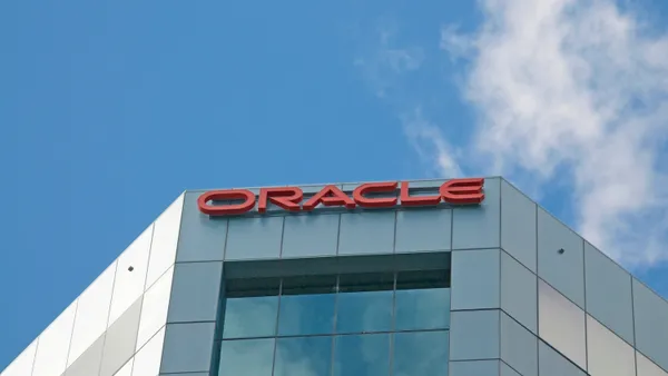 Oracle corporation sign hanging on the top of the building in Brisbane.